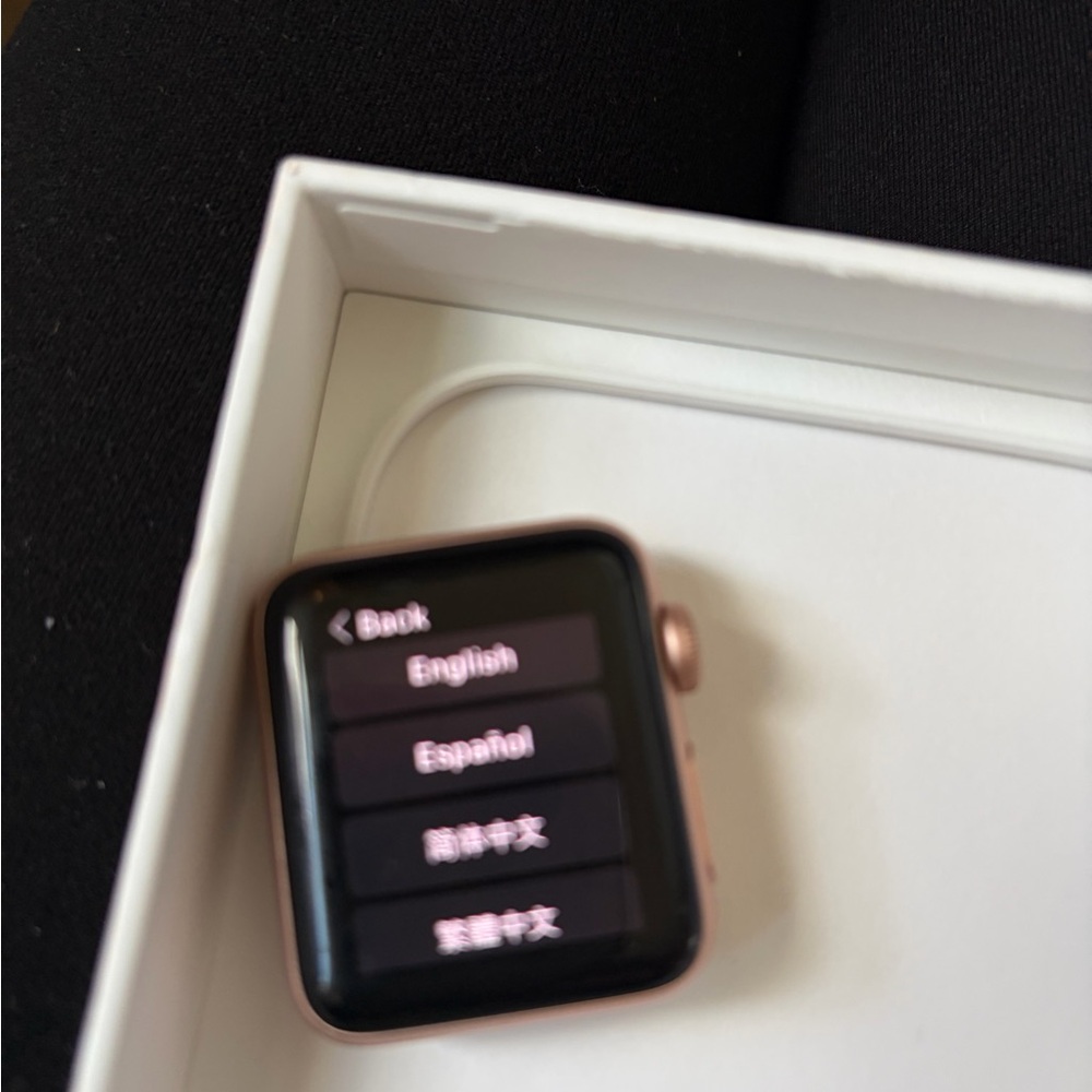 Apple Smartwatch with Black Screen and Gold Edges
